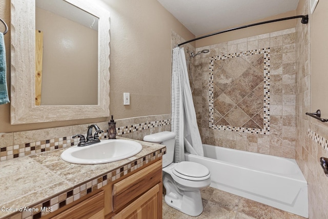 1529 S Saddleback Dr, Coeur Dalene, ID 83814 - full bathroom with shower / bath combo, vanity, backsplash, and tile walls