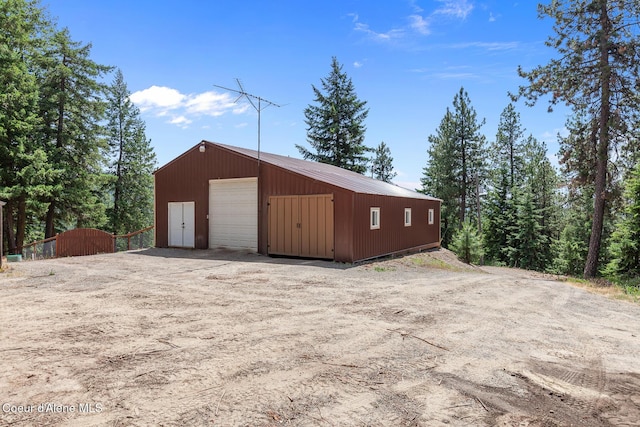 1529 S Saddleback Dr, Coeur Dalene, ID 83814 - detached garage featuring driveway