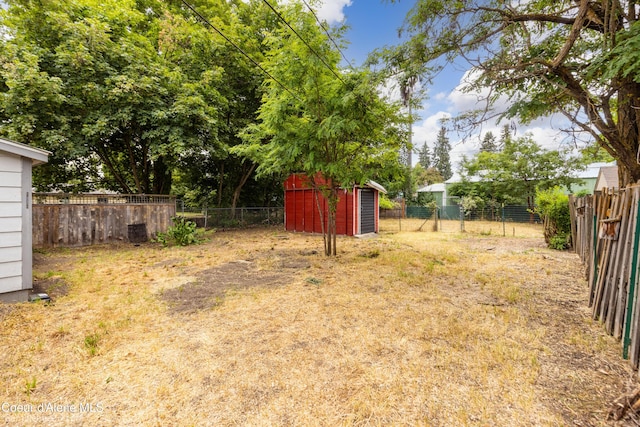 421 W Walnut Ave, Coeur Dalene, ID 83814 - fenced backyard with a storage shed