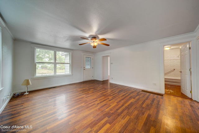 421 W Walnut Ave, Coeur Dalene, ID 83814 - unfurnished living room featuring crown molding, ceiling fan, and wood finished floors