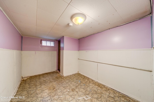 421 W Walnut Ave, Coeur Dalene, ID 83814 - below grade area featuring a wainscoted wall