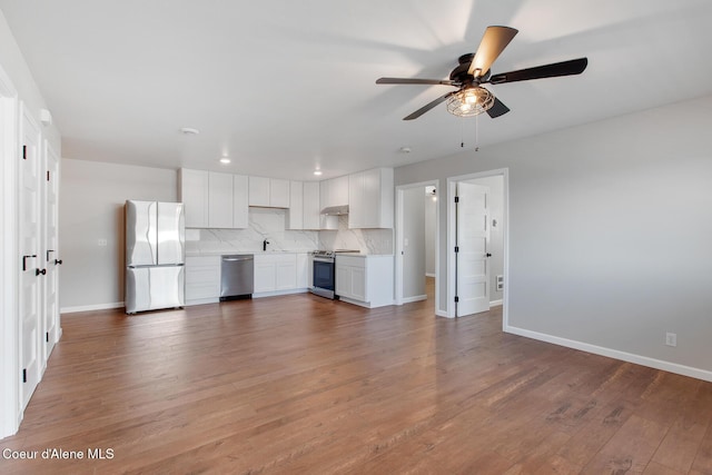 1313 N Division Ave Unit C, Sandpoint, ID 83864 - unfurnished living room with ceiling fan, light wood finished floors, and recessed lighting