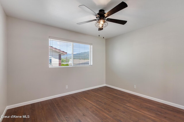 1313 N Division Ave Unit C, Sandpoint, ID 83864 - empty room with dark wood-type flooring and ceiling fan