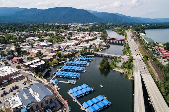 1313 N Division Ave Unit C, Sandpoint, ID 83864 - drone / aerial view of a notable bridge and a water and mountain view