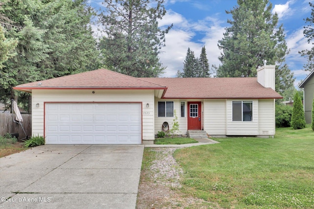 7575 W Crenshaw St, Rathdrum, ID 83858 - single story home featuring driveway, a chimney, an attached garage, a shingled roof, and entry steps