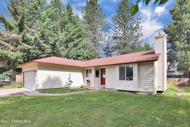 7575 W Crenshaw St, Rathdrum, ID 83858 - single story home with a chimney, concrete driveway, and a garage