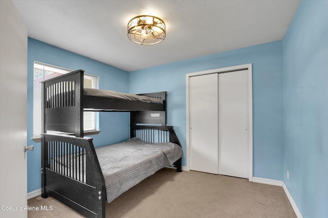 7575 W Crenshaw St, Rathdrum, ID 83858 - carpeted bedroom with baseboards and a closet