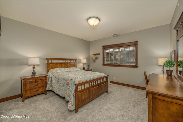 2050 N Main St, Coeur Dalene, ID 83814 - bedroom with baseboards and light carpet
