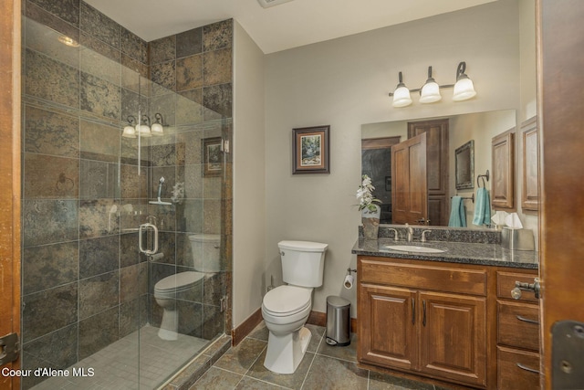 2050 N Main St, Coeur Dalene, ID 83814 - bathroom featuring vanity, a shower stall, and tile patterned flooring