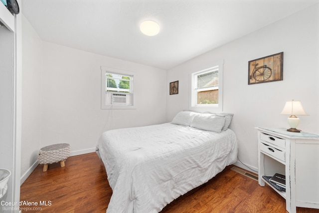 1025 N 1st St, Coeur Dalene, ID 83814 - bedroom featuring wood finished floors and cooling unit