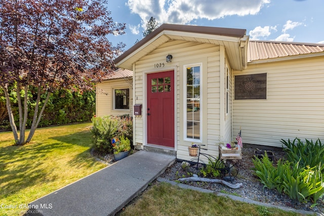 1025 N 1st St, Coeur Dalene, ID 83814 - entrance to property with a lawn and a metal roof