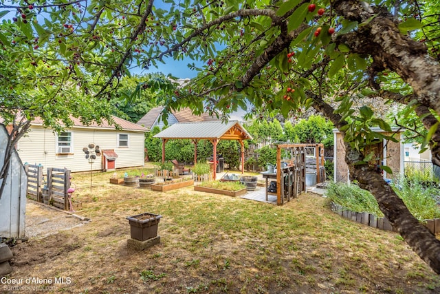 1025 N 1st St, Coeur Dalene, ID 83814 - view of yard with a garden and a gazebo