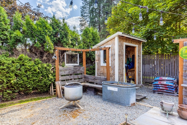 1025 N 1st St, Coeur Dalene, ID 83814 - view of patio / terrace featuring a shed