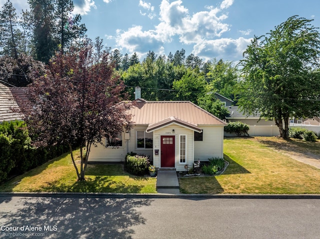 1025 N 1st St, Coeur Dalene, ID 83814 - view of front of house with a front lawn and a metal roof