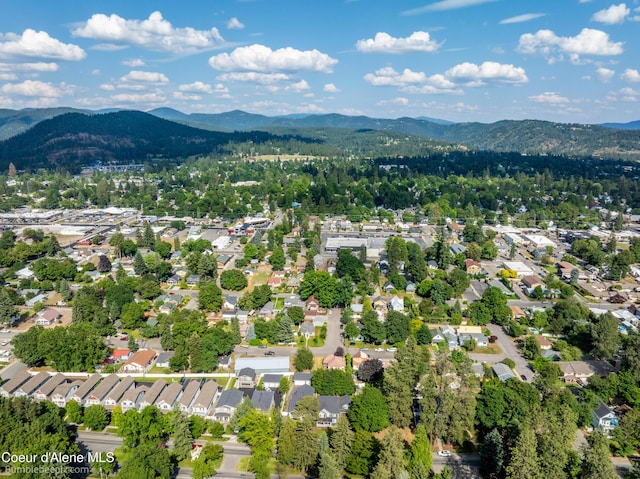 1025 N 1st St, Coeur Dalene, ID 83814 - aerial view of residential area with a mountainous background