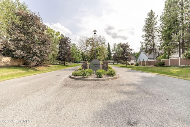 12608 N Shamrock St, Hayden, ID 83835 - view of asphalt road with street lights