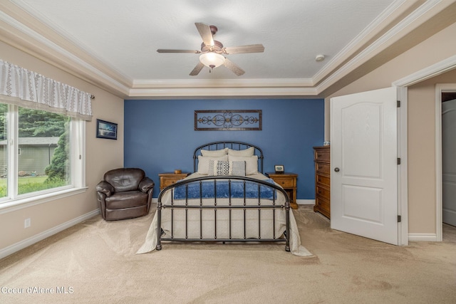12608 N Shamrock St, Hayden, ID 83835 - bedroom featuring carpet floors, ornamental molding, a ceiling fan, and a tray ceiling