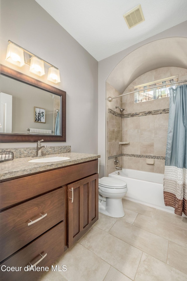 12608 N Shamrock St, Hayden, ID 83835 - full bathroom featuring shower / tub combo, vanity, and tile patterned flooring
