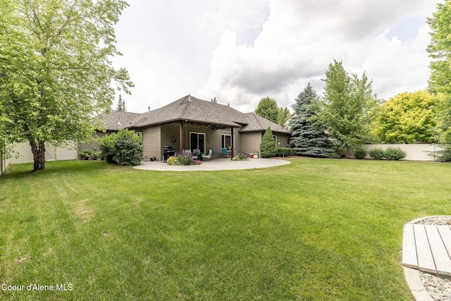 12608 N Shamrock St, Hayden, ID 83835 - view of yard with a patio area
