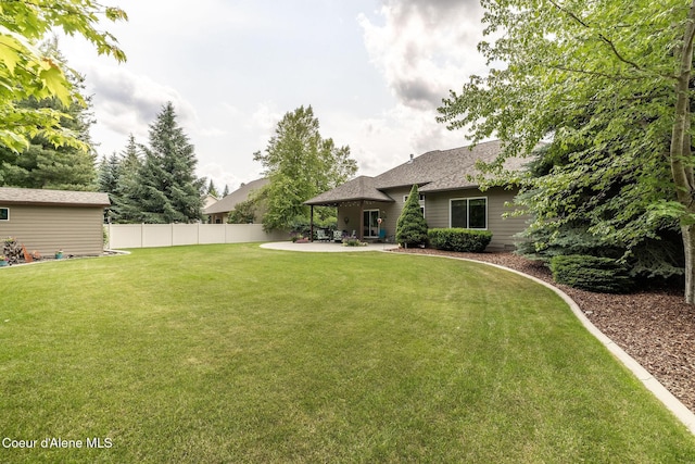 12608 N Shamrock St, Hayden, ID 83835 - view of yard featuring a patio