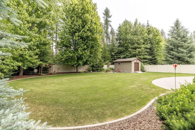 12608 N Shamrock St, Hayden, ID 83835 - view of yard with a storage unit
