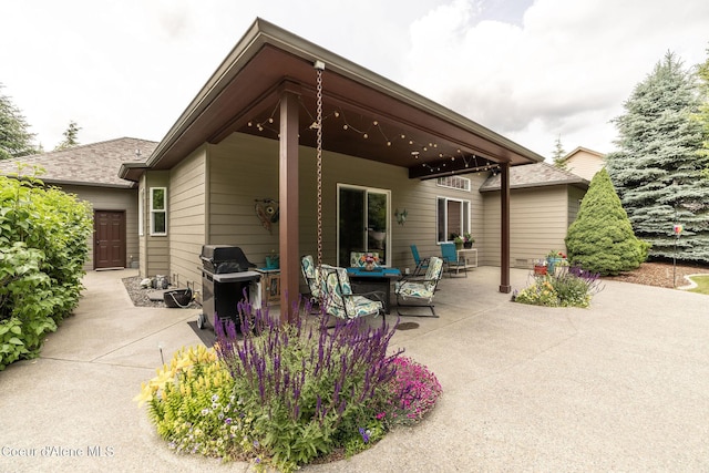 12608 N Shamrock St, Hayden, ID 83835 - view of patio featuring a grill