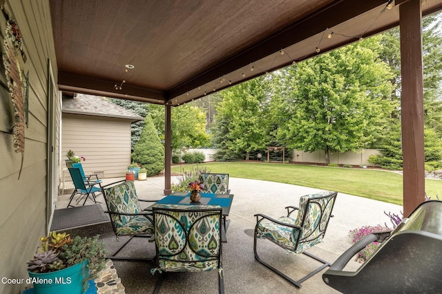 12608 N Shamrock St, Hayden, ID 83835 - fenced backyard featuring a patio area