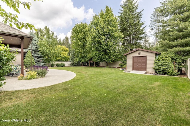 12608 N Shamrock St, Hayden, ID 83835 - view of yard featuring a storage shed