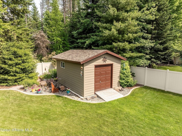 12608 N Shamrock St, Hayden, ID 83835 - view of shed with a fenced backyard