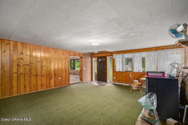 1875 S Gateway Ranch Rd, Coeur Dalene, ID 83814 - miscellaneous room featuring wooden walls and carpet