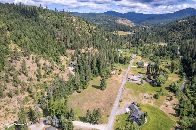 1875 S Gateway Ranch Rd, Coeur Dalene, ID 83814 - aerial view of property and surrounding area featuring a forest and mountains