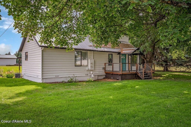 916 E Hanley Ave, Dalton Gardens, ID 83815 - rear view of property with a deck and a metal roof