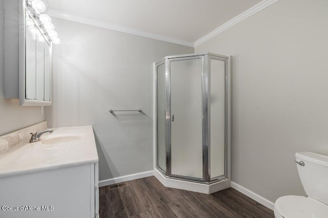 916 E Hanley Ave, Dalton Gardens, ID 83815 - bathroom with vanity, wood finished floors, a shower stall, and crown molding