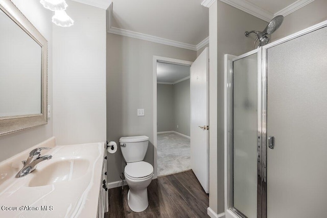 916 E Hanley Ave, Dalton Gardens, ID 83815 - full bath with wood finished floors, a stall shower, crown molding, and vanity