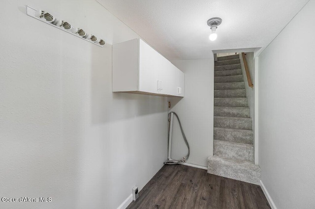 916 E Hanley Ave, Dalton Gardens, ID 83815 - stairs featuring wood finished floors and baseboards