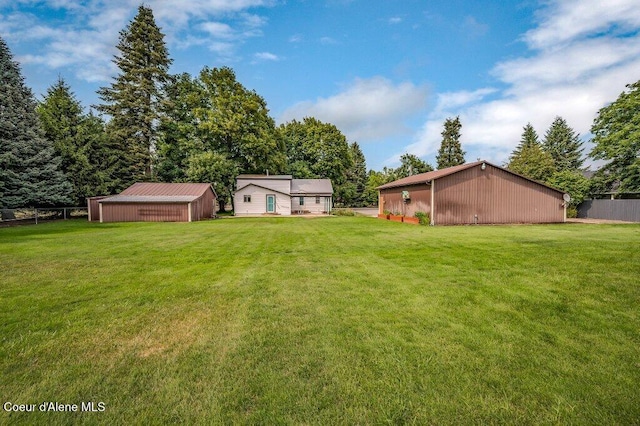 916 E Hanley Ave, Dalton Gardens, ID 83815 - view of yard with an outbuilding and an outdoor structure