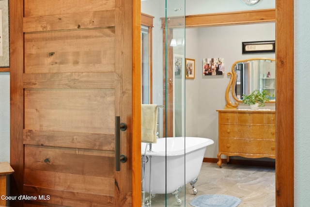 4127 Sagle Rd, Sagle, ID 83860 - full bathroom featuring a freestanding bath and vanity