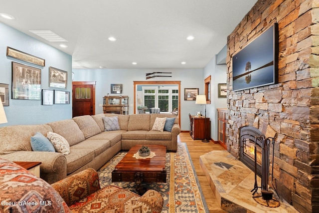 4127 Sagle Rd, Sagle, ID 83860 - living area featuring light wood finished floors, recessed lighting, and a fireplace