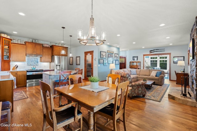 4127 Sagle Rd, Sagle, ID 83860 - dining space featuring light wood finished floors, recessed lighting, and a chandelier