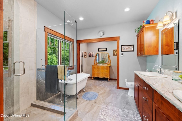 4127 Sagle Rd, Sagle, ID 83860 - full bath featuring a freestanding tub, a shower stall, double vanity, recessed lighting, and marble finish floors