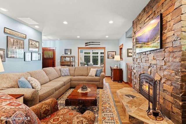 4127 Sagle Rd, Sagle, ID 83860 - living room featuring light wood finished floors, recessed lighting, and a fireplace