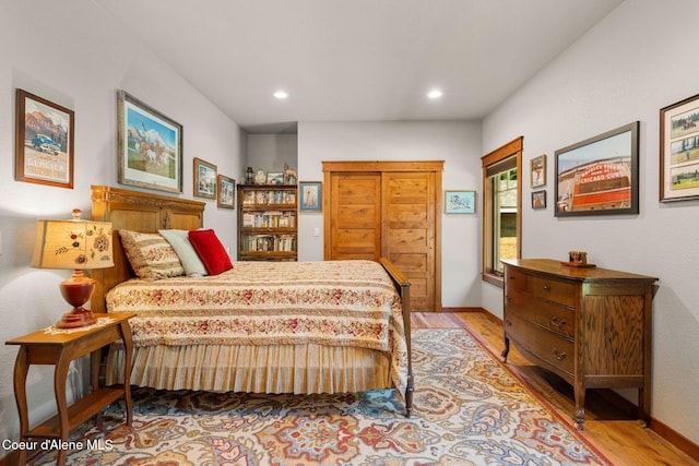 4127 Sagle Rd, Sagle, ID 83860 - bedroom with light wood-style floors and recessed lighting