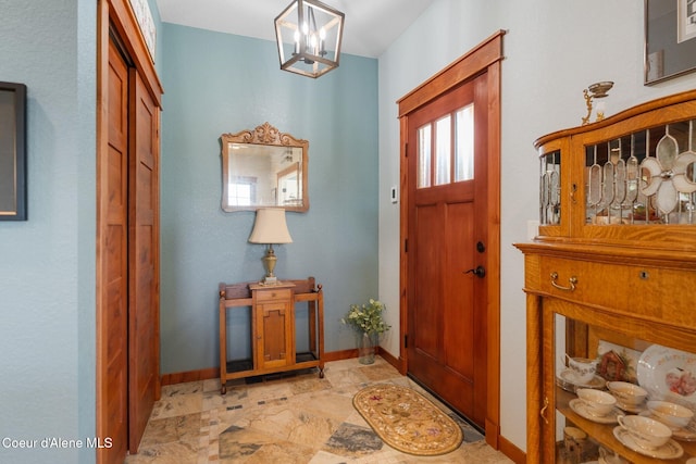 4127 Sagle Rd, Sagle, ID 83860 - entryway with a chandelier and baseboards