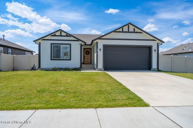 10514 N Liverpool Loop, Hayden, ID 83835 - ranch-style home with an attached garage and concrete driveway