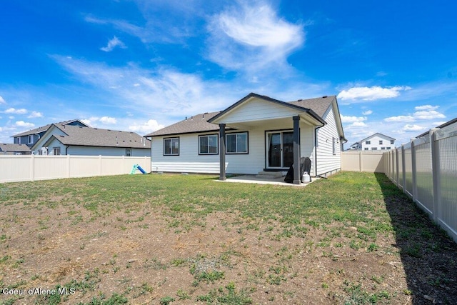 10514 N Liverpool Loop, Hayden, ID 83835 - back of house with a patio and a fenced backyard