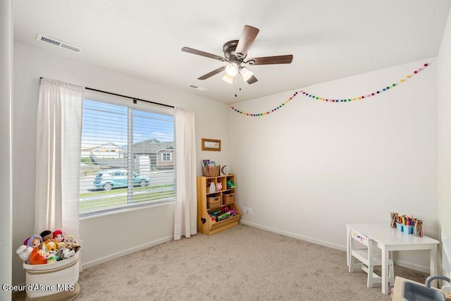 10514 N Liverpool Loop, Hayden, ID 83835 - game room featuring a ceiling fan and carpet floors