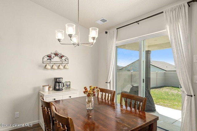 10514 N Liverpool Loop, Hayden, ID 83835 - dining room featuring a chandelier