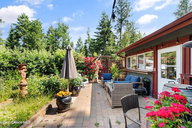 5143 W Crazy Creek Rd, Coeur Dalene, ID 83814 - view of patio / terrace with outdoor lounge area
