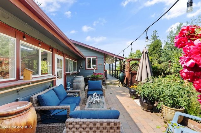 5143 W Crazy Creek Rd, Coeur Dalene, ID 83814 - view of patio / terrace with an outdoor living space