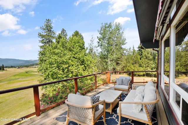 5143 W Crazy Creek Rd, Coeur Dalene, ID 83814 - wooden deck with a mountain view